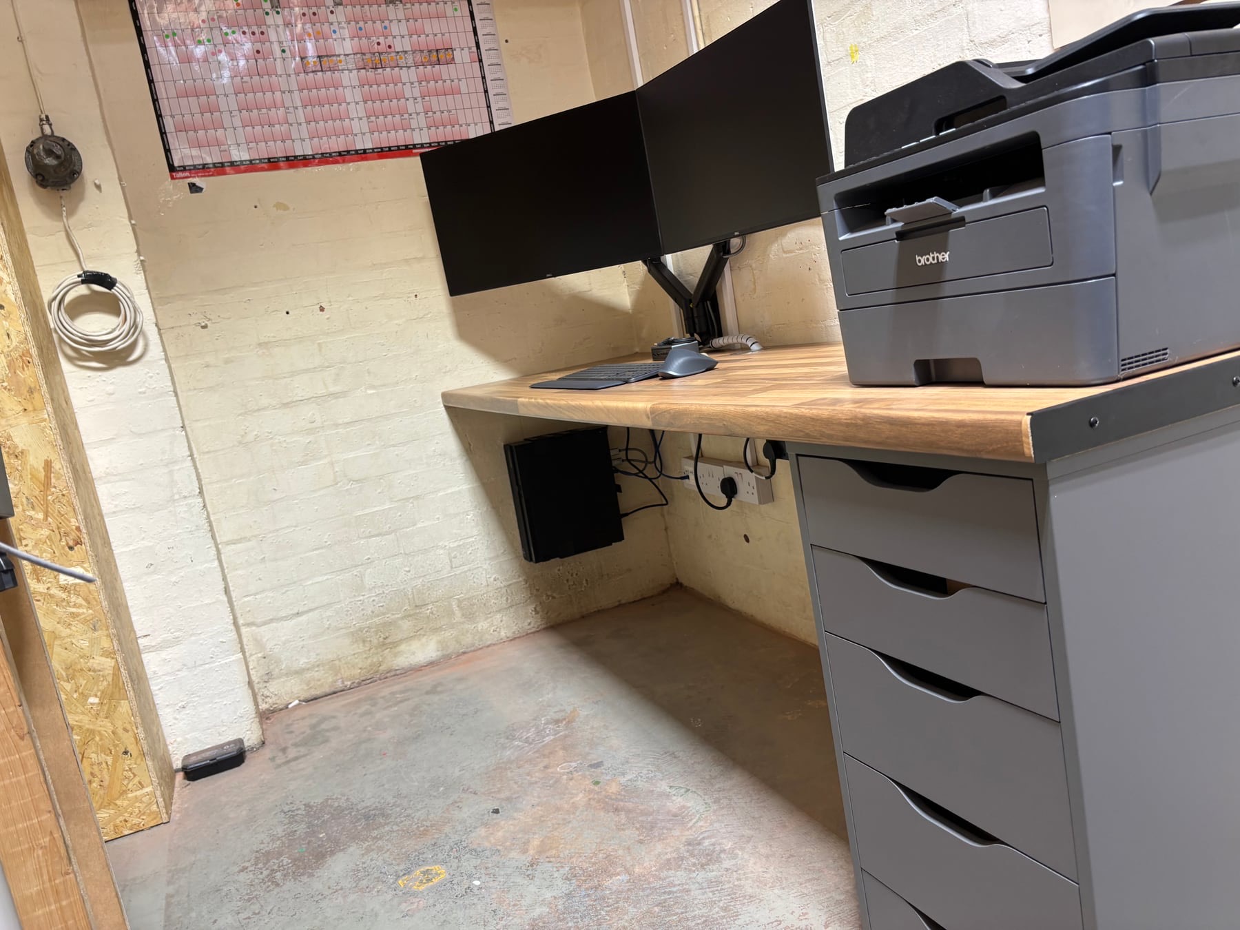 Completed office desk, storage, desktop computer and dual displays