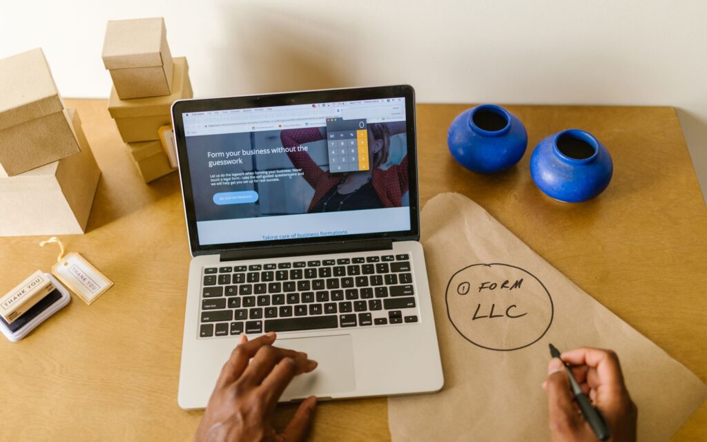 Small business workspace with a laptop and packaged products